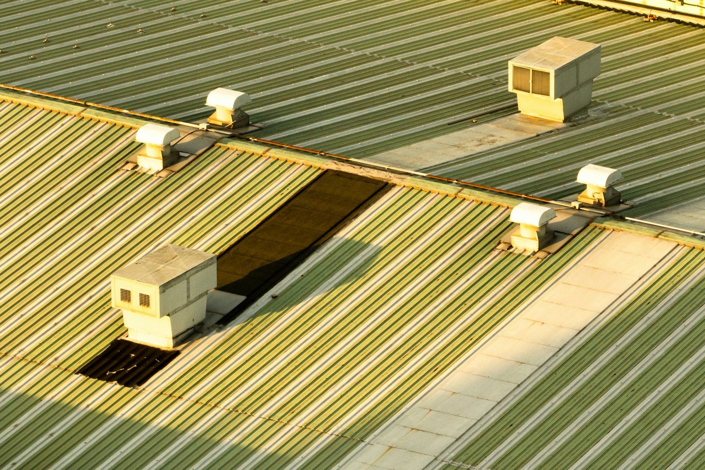 Corrugated metal roof with vents
